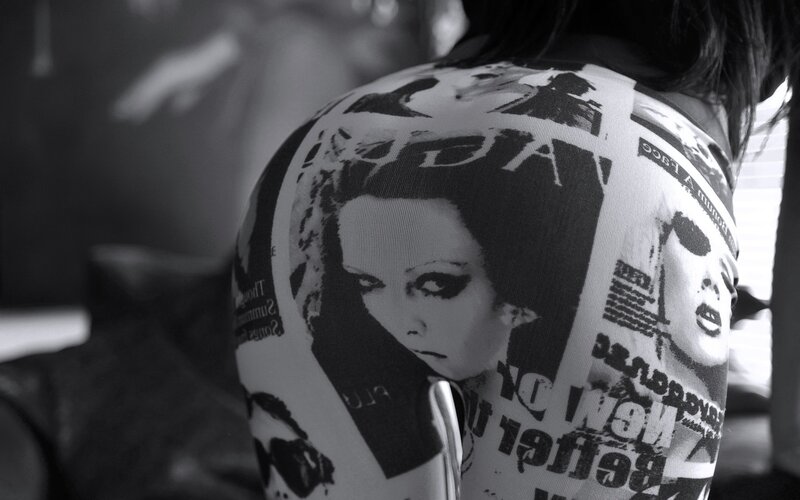 back view of person in printed top
