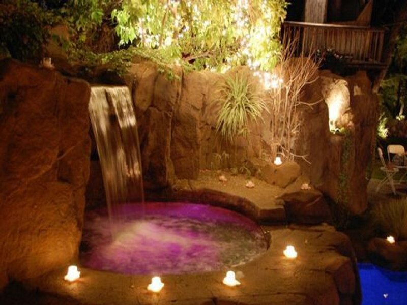 Backyard Hot Tub with Waterfall