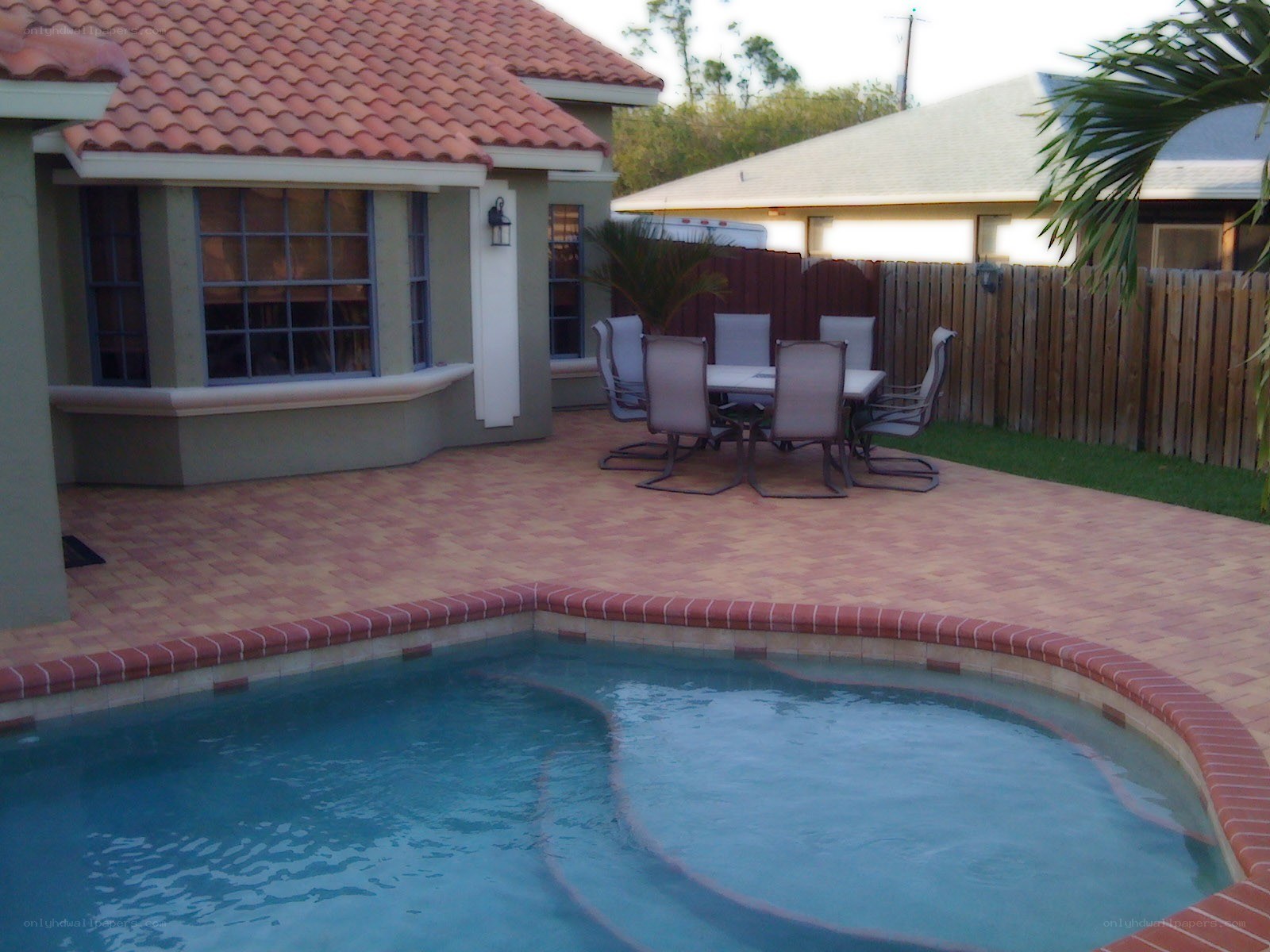 Backyard pool and patio area