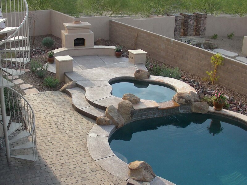 Backyard pool with spiral staircase