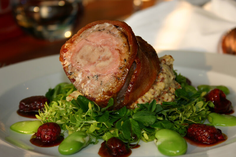 Bacon-wrapped meat roll with salad