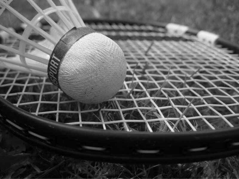 Badminton Shuttlecock on Racket