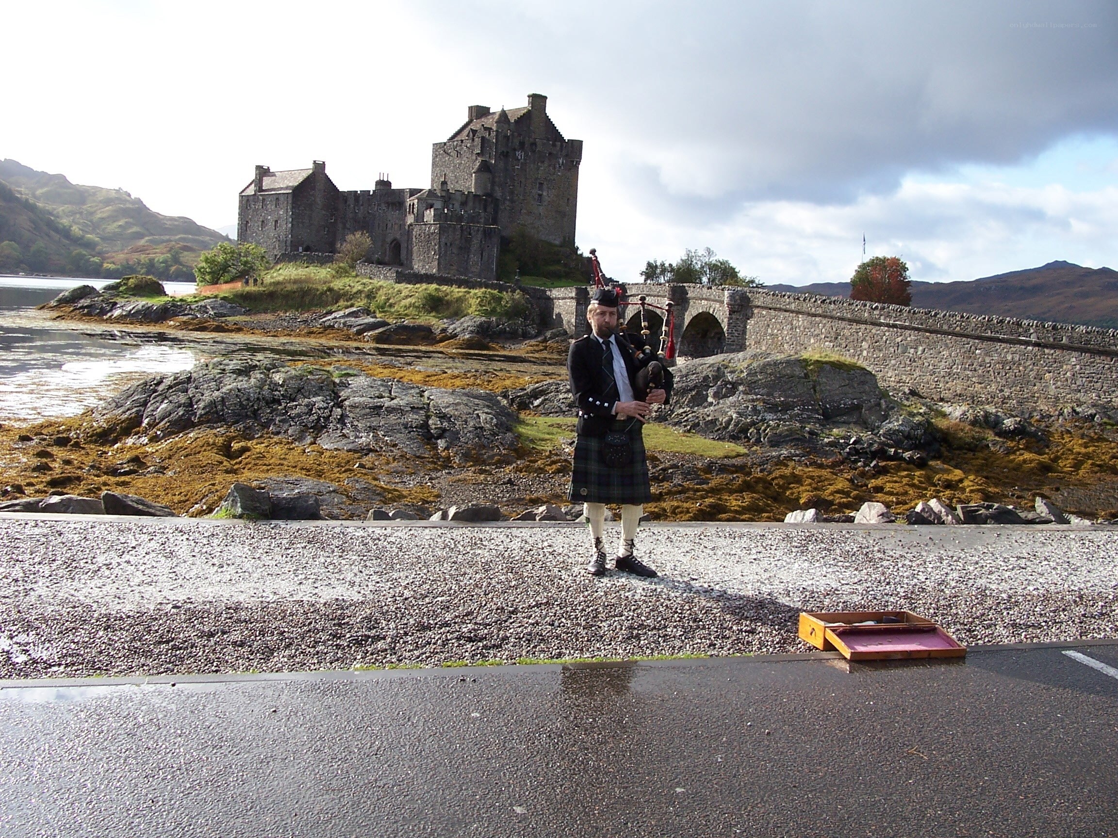 Bagpiper at Eilean Donan Castle