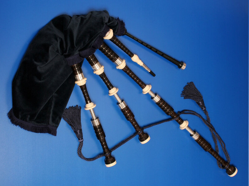 Bagpipes with case on blue background