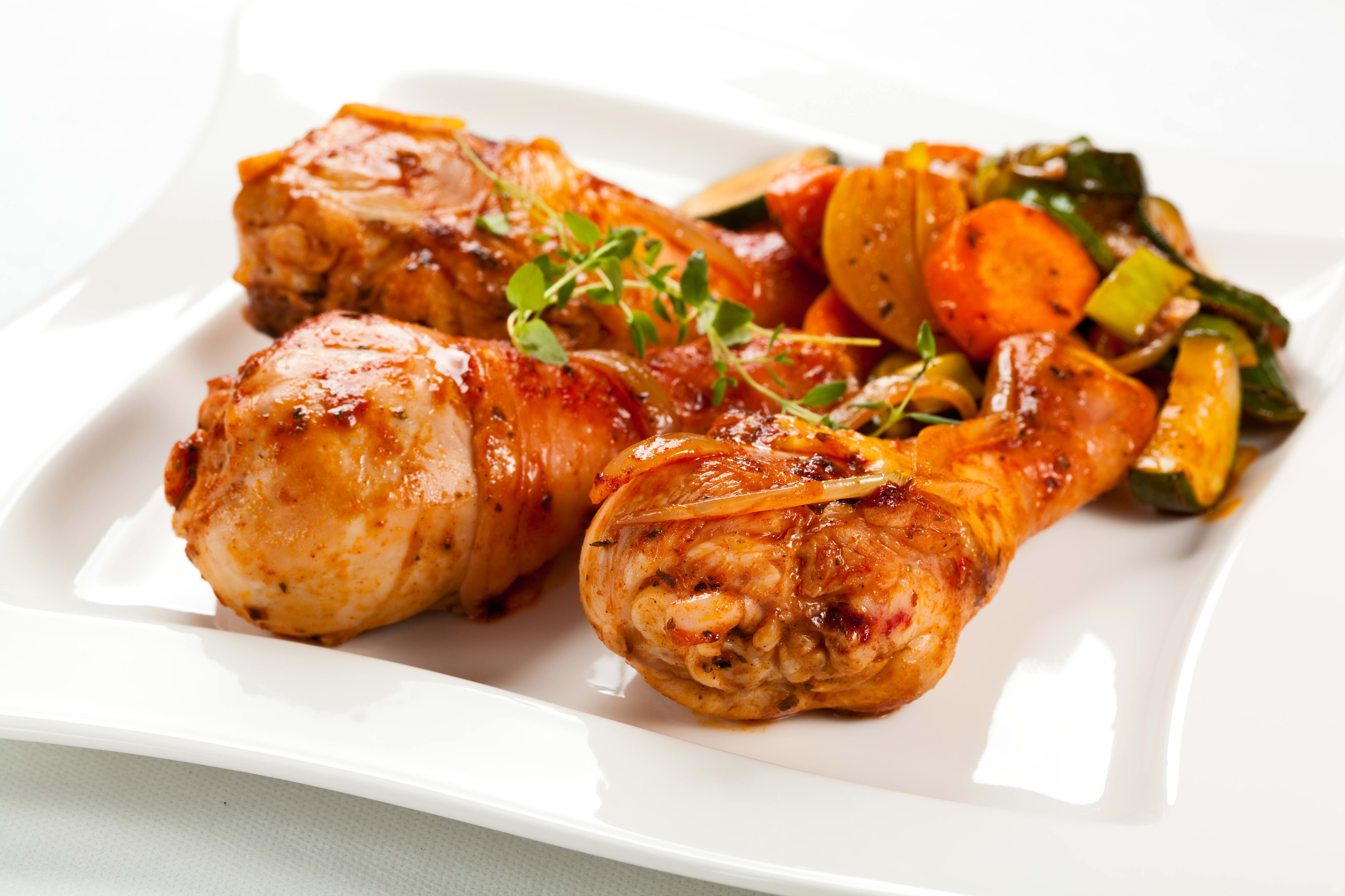 Baked chicken legs with vegetables