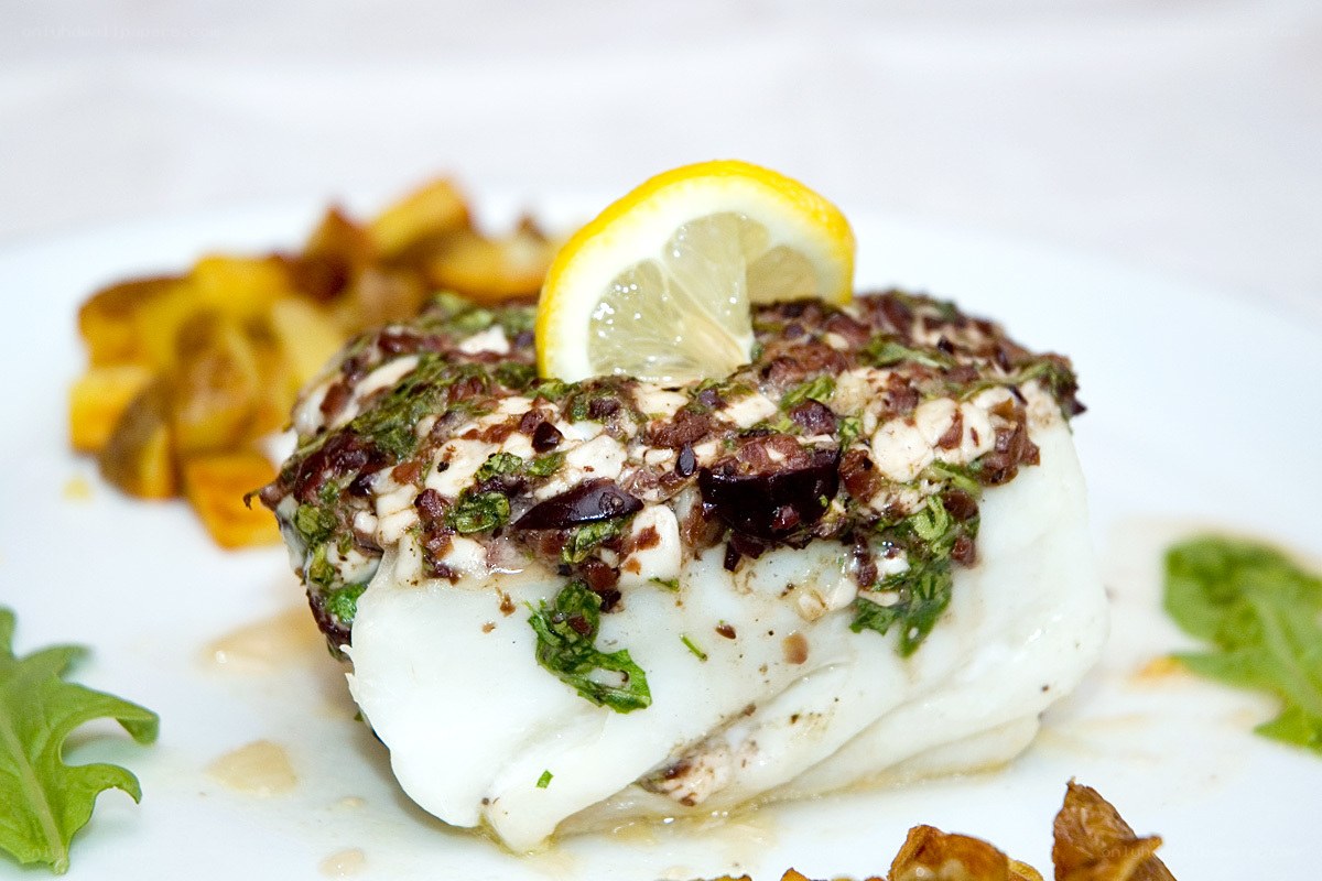 Baked fish with lemon and herbs