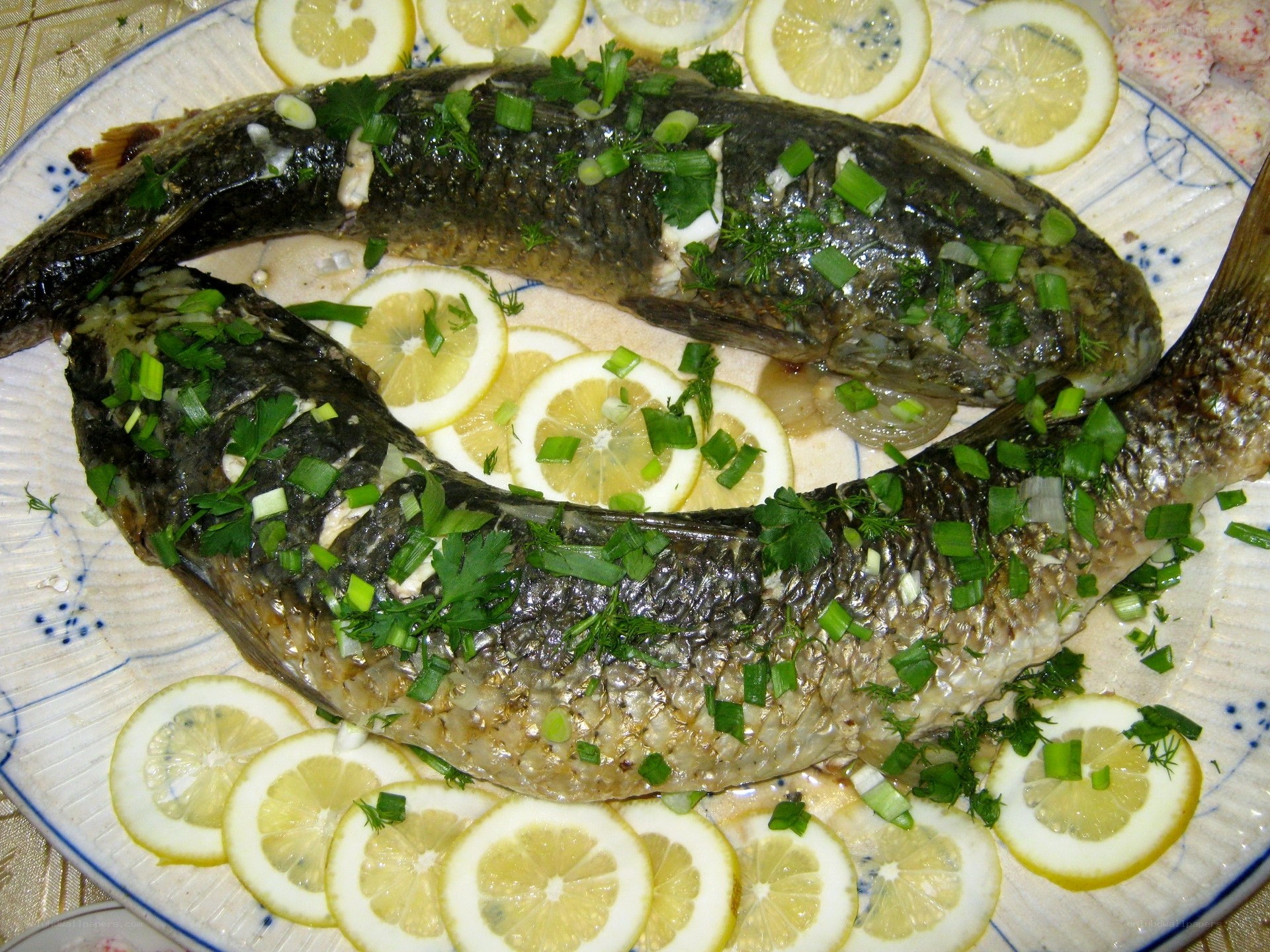 Baked fish with lemon and herbs