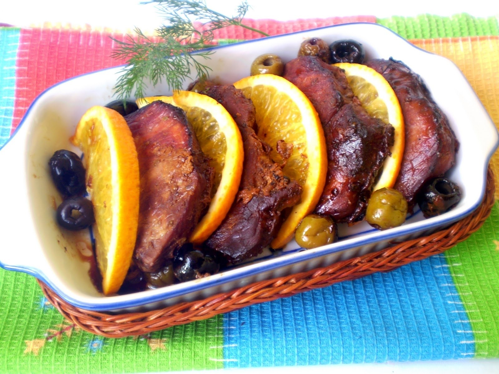 Baked meat with oranges and olives