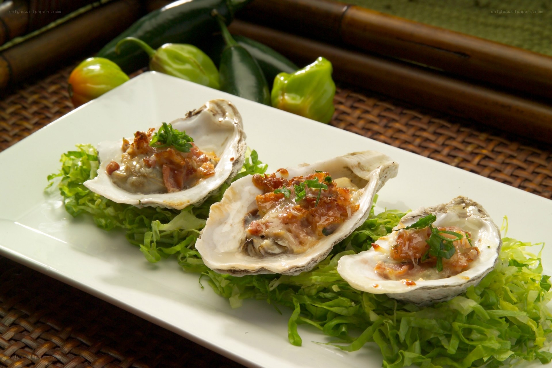 Baked oysters on lettuce