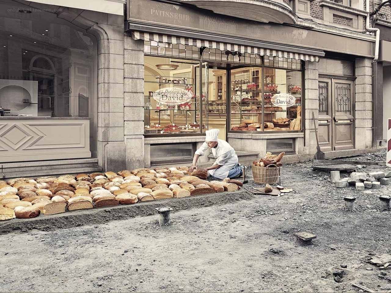 Baker at work outside shop