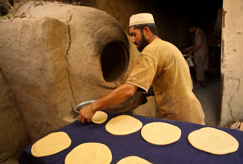 Baker preparing flatbreads