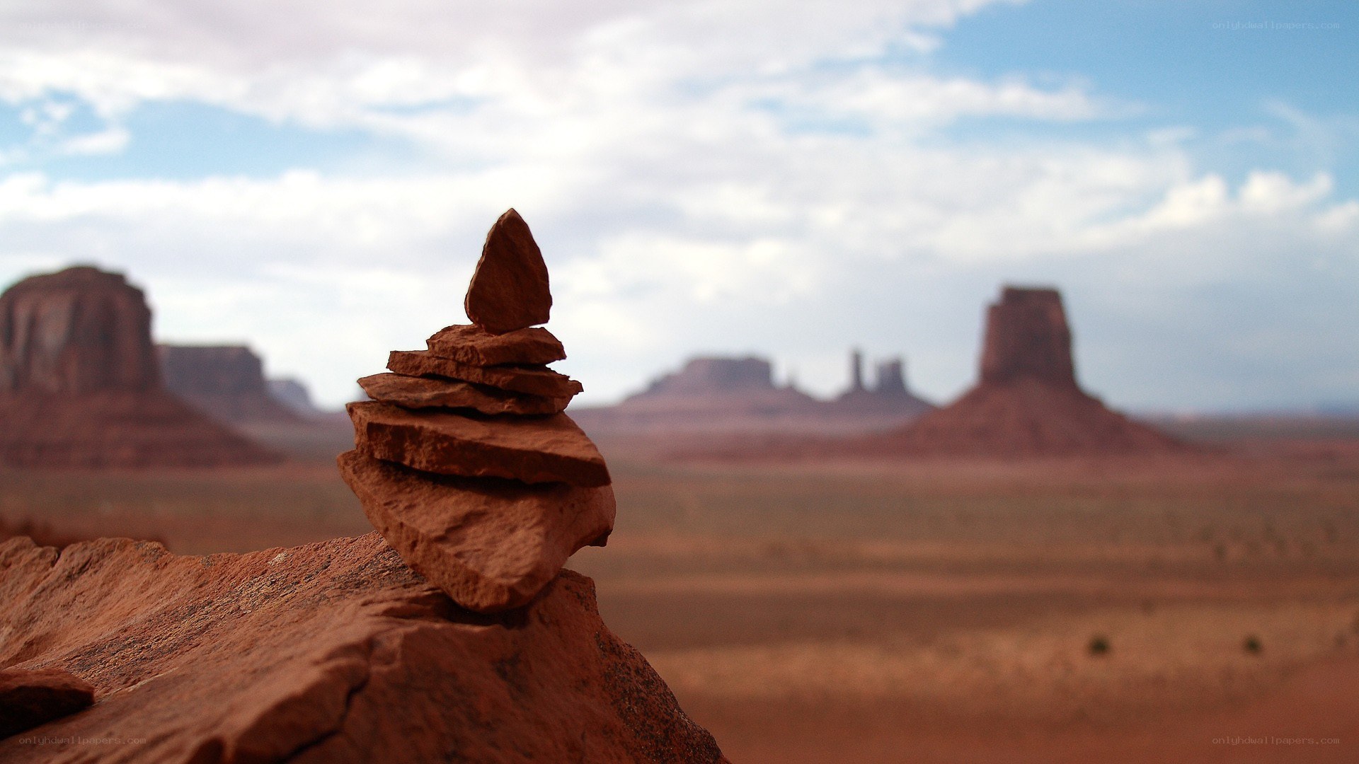 balanced rock stack in desert
