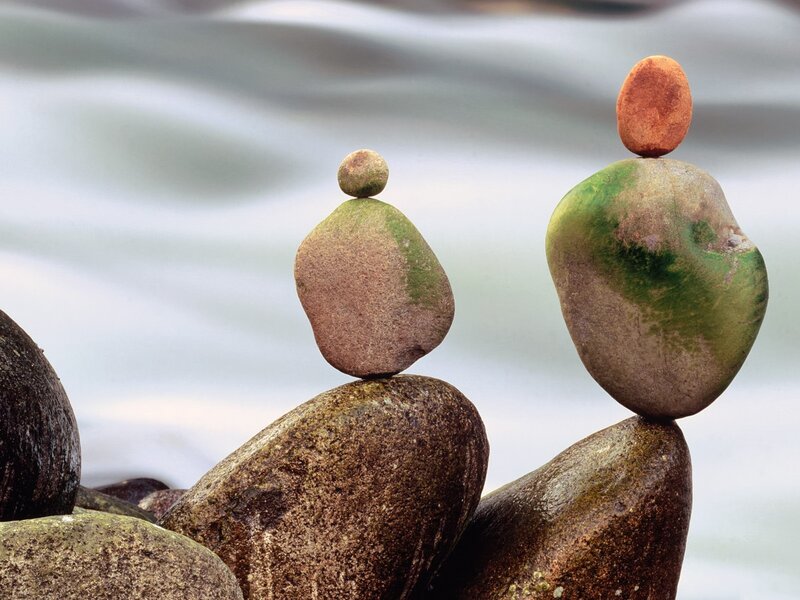 Balanced rocks by water