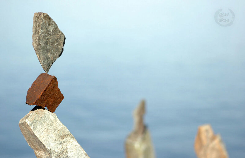 Balanced rocks on a pole