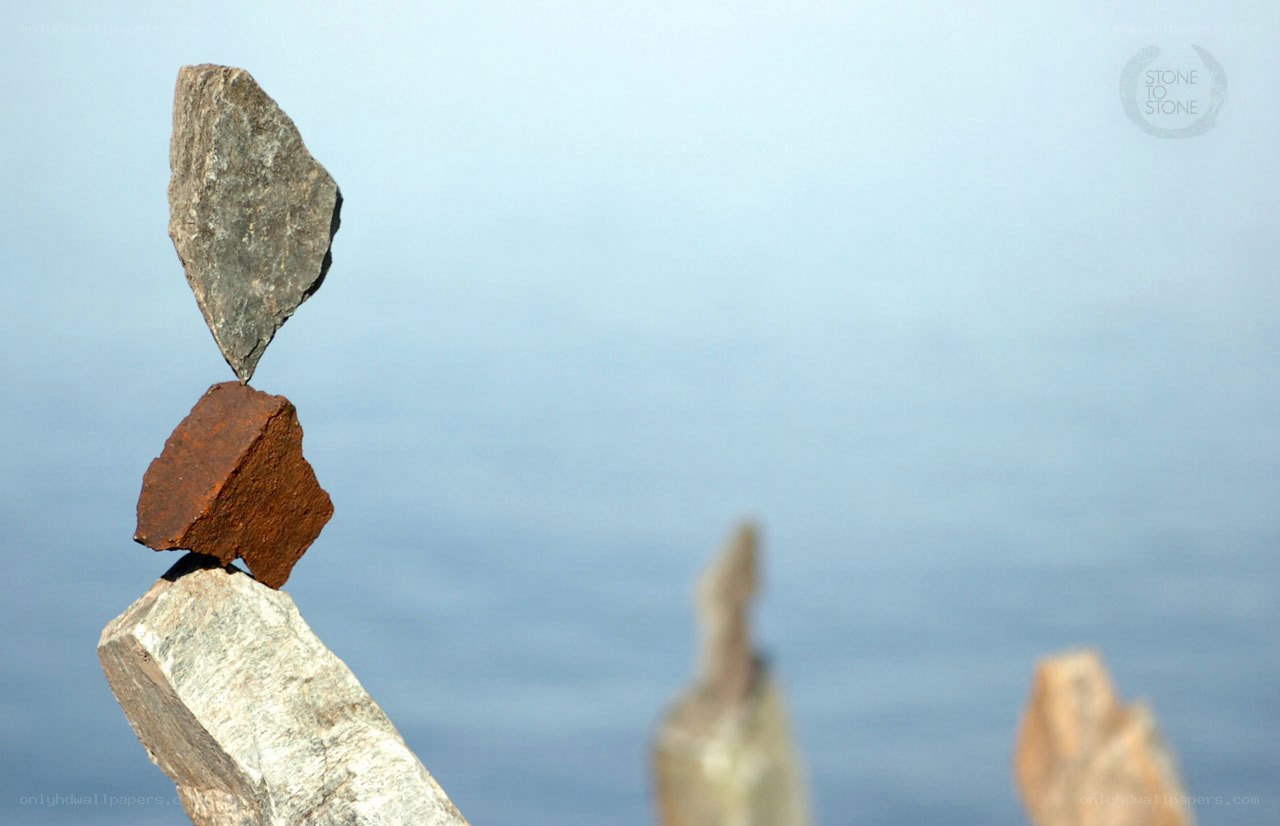 Balanced rocks on a pole