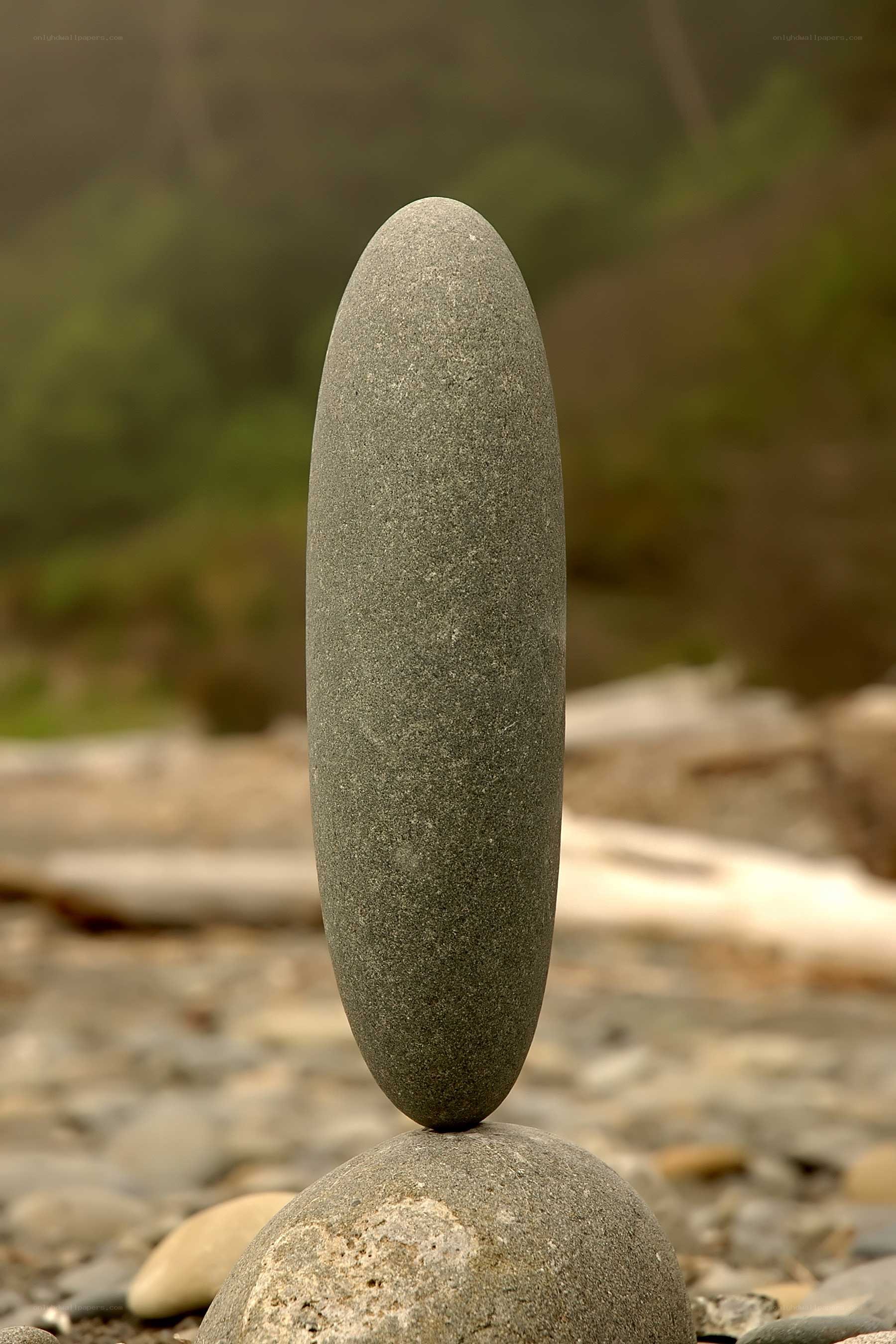Balanced stones on beach