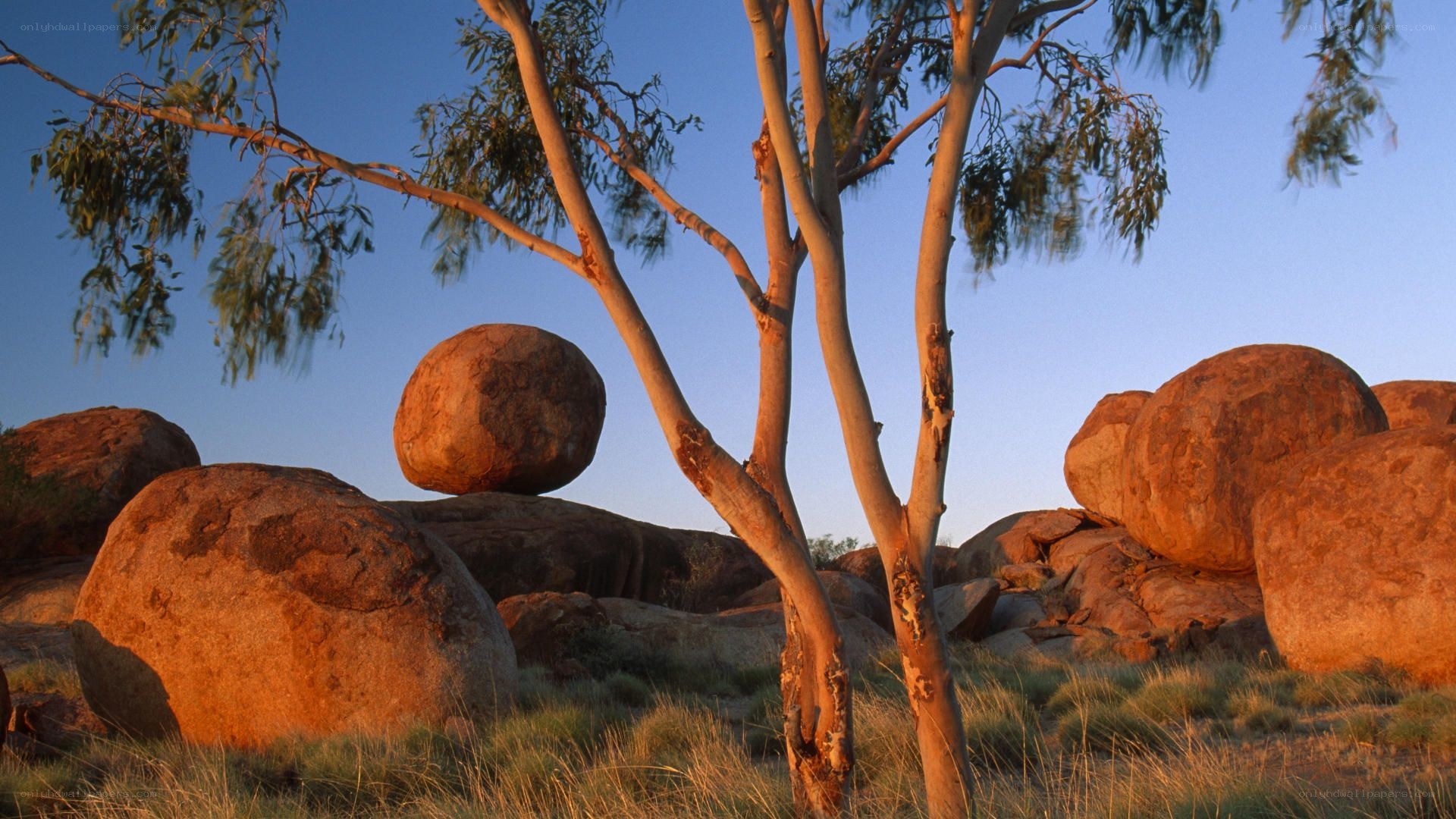 Balancing rocks at sunset