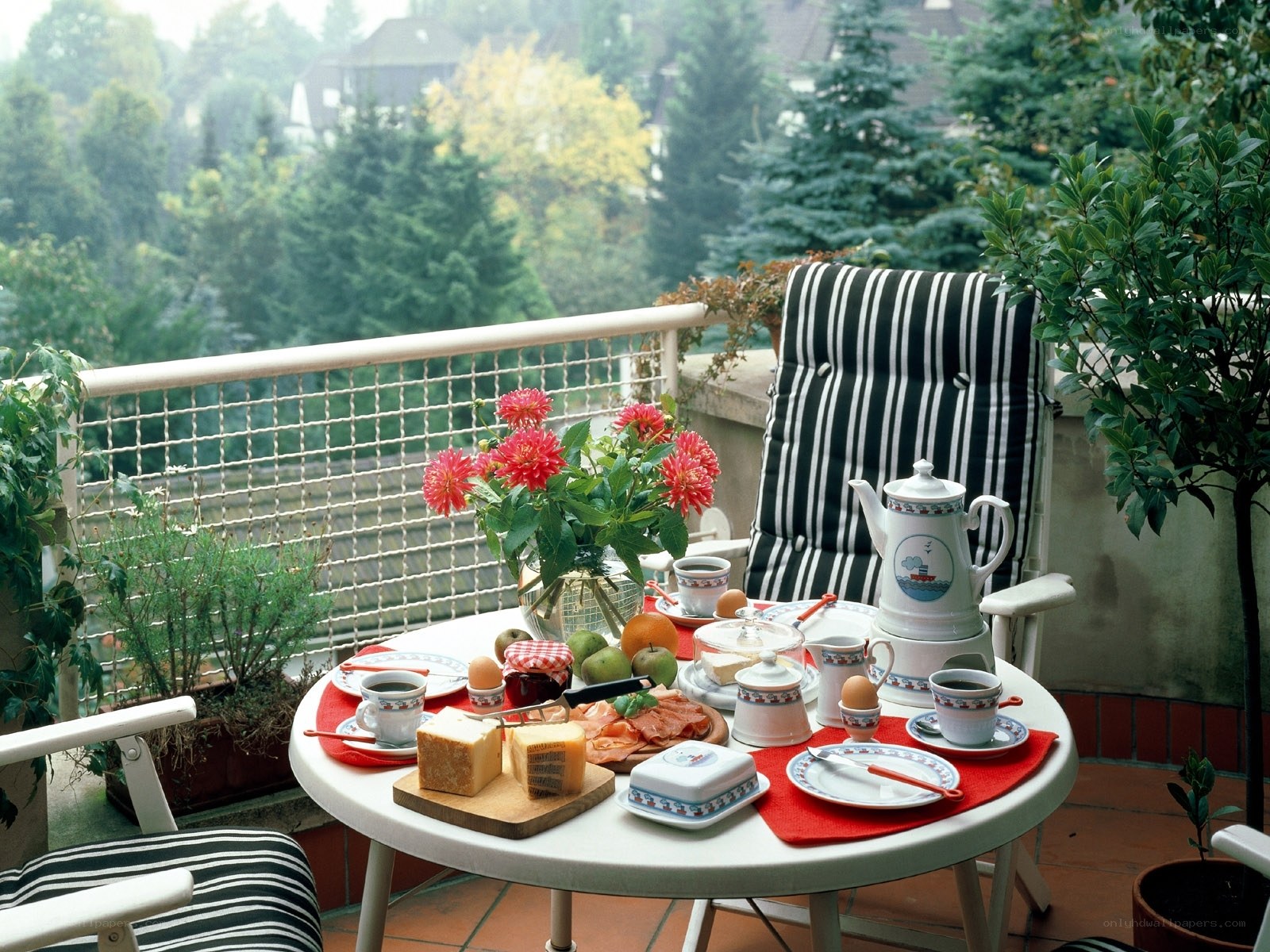 Balcony breakfast with flowers