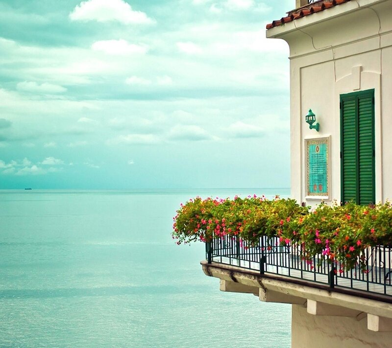 Balcony Overlooking Sea — Blue, Serene, Afternoon, Photograph, Flowers