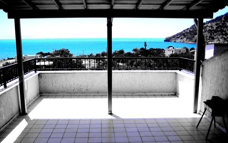 Balcony Overlooking Sea — Blue, Serene, Afternoon, Photograph, Mountain