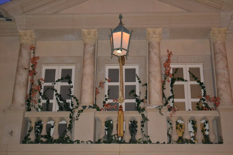 Balcony with Columns and Lamp