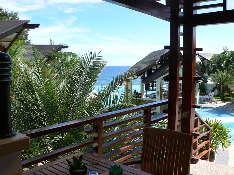 Balcony with Ocean View — Blue, Serene, Afternoon