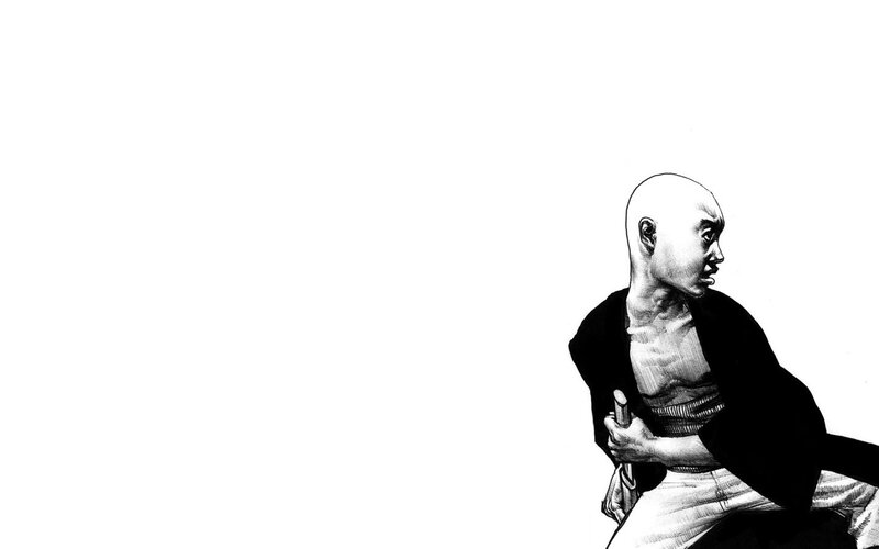 bald man holding a sword
