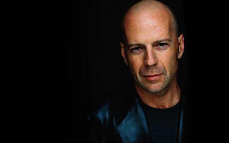 Bald Man in Black Jacket — Serious, Photograph