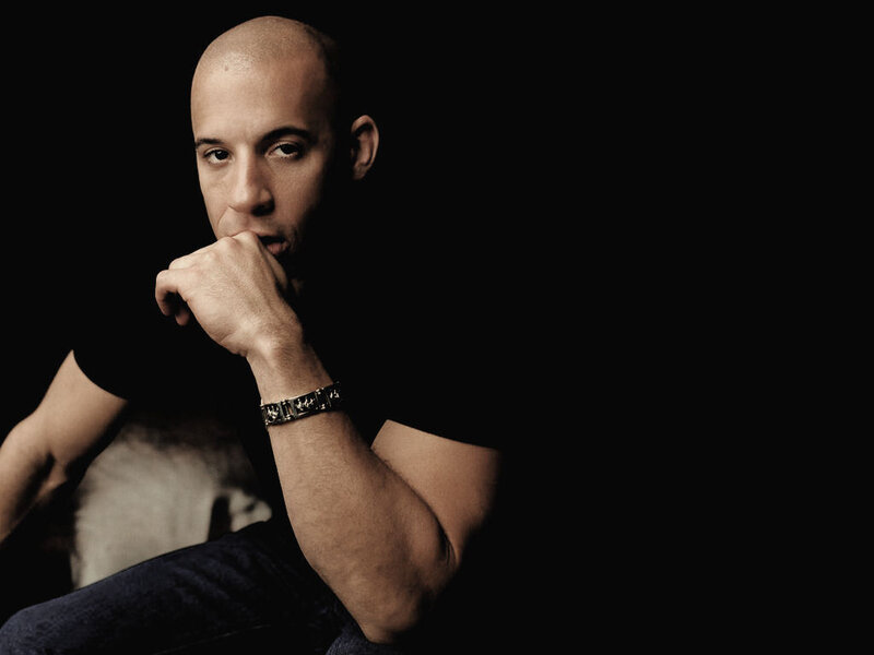 Bald Man in Black Shirt