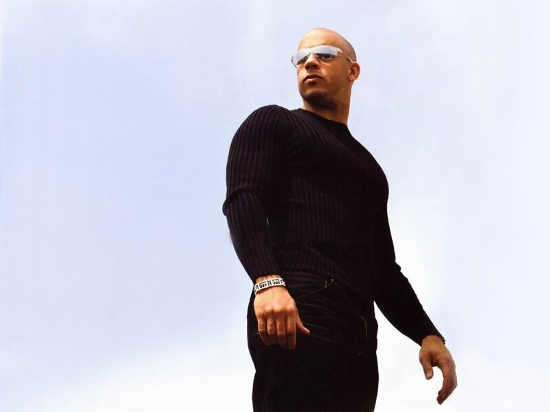 Bald Man in Black Sweater