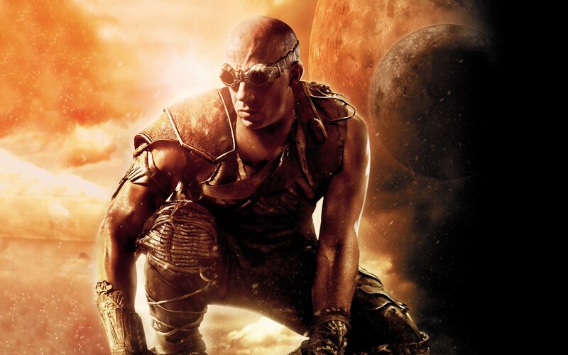 Bald Man in Goggles — Orange, Dramatic