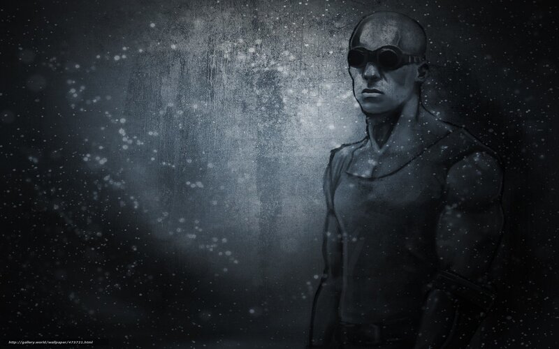 bald man in goggles