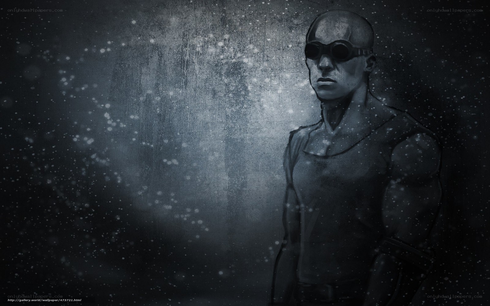 bald man in goggles