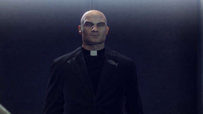 bald man in priest attire