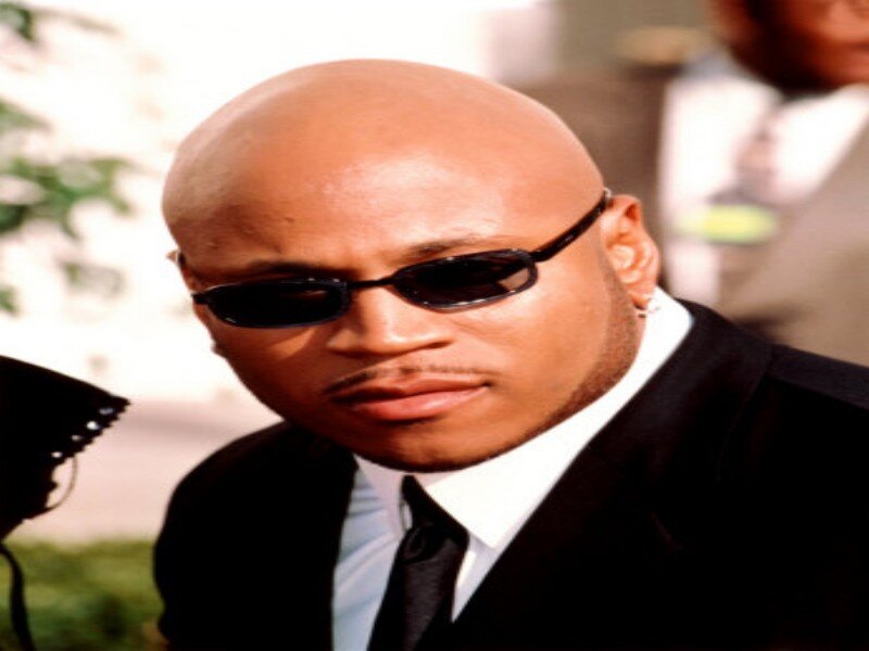 Bald Man in Suit — Black, Serious, Afternoon