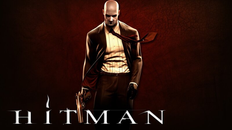Bald Man in Suit — Brown, Dark, Dramatic