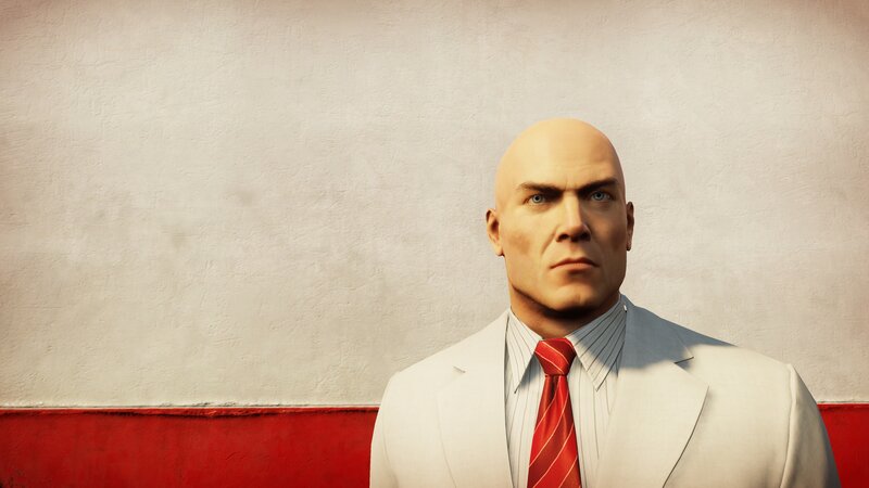 Bald Man in Suit — White, Serious