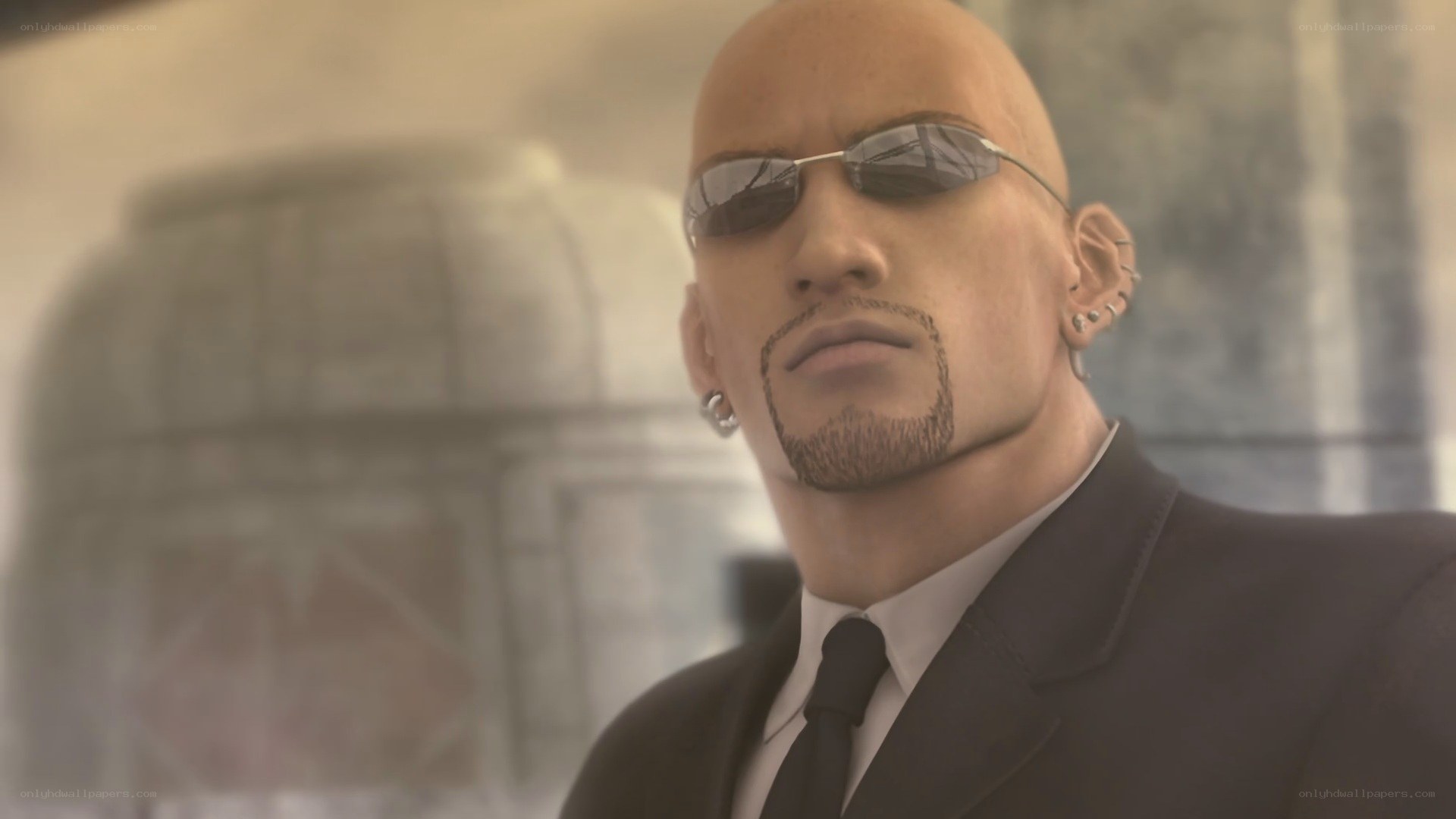 bald man in sunglasses