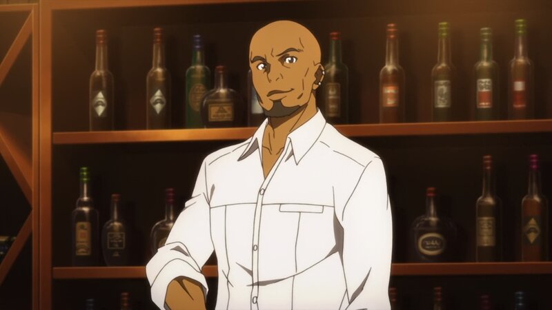 bald man in white shirt