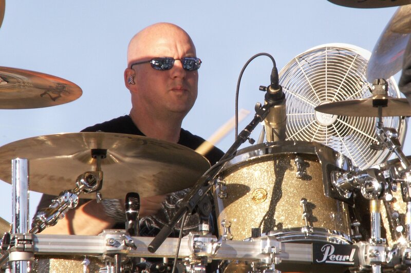 Bald Man Playing Drums