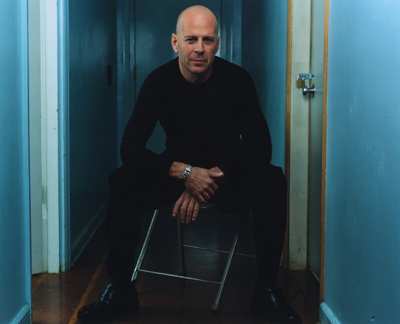 Bald Man Sitting