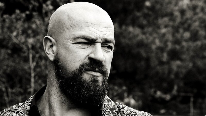 Bald Man with Beard — Black, Serious