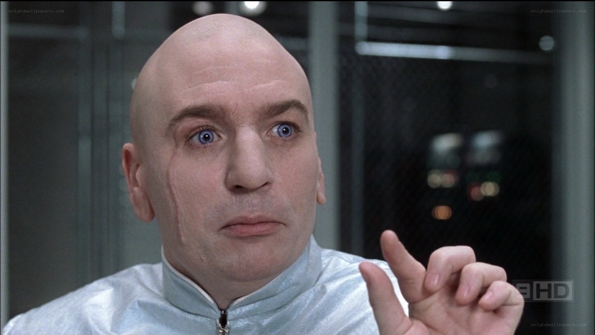 bald man with blue eyes