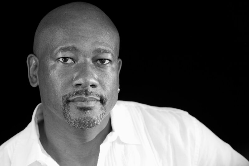 Bald Man with Goatee — Black, Serious, Photograph