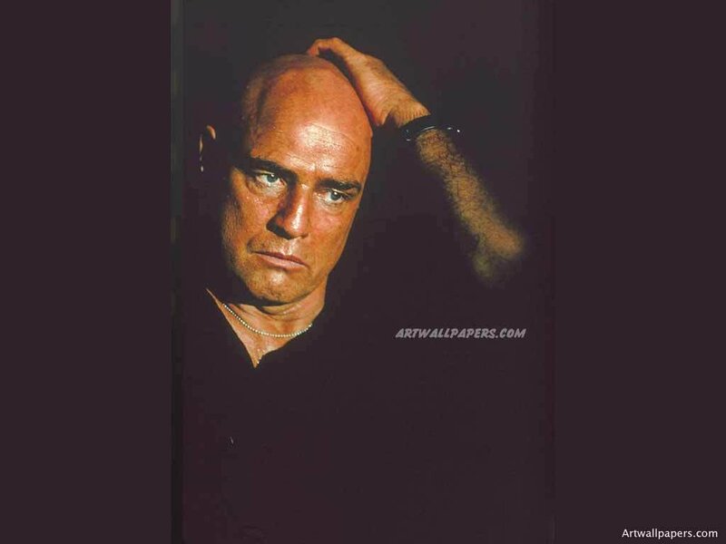 Bald Man with Hand on Head