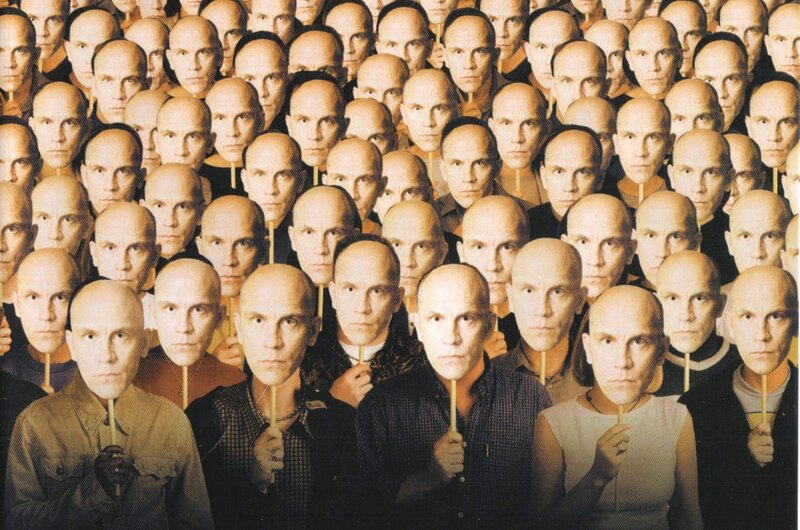 Bald Men Holding Masks