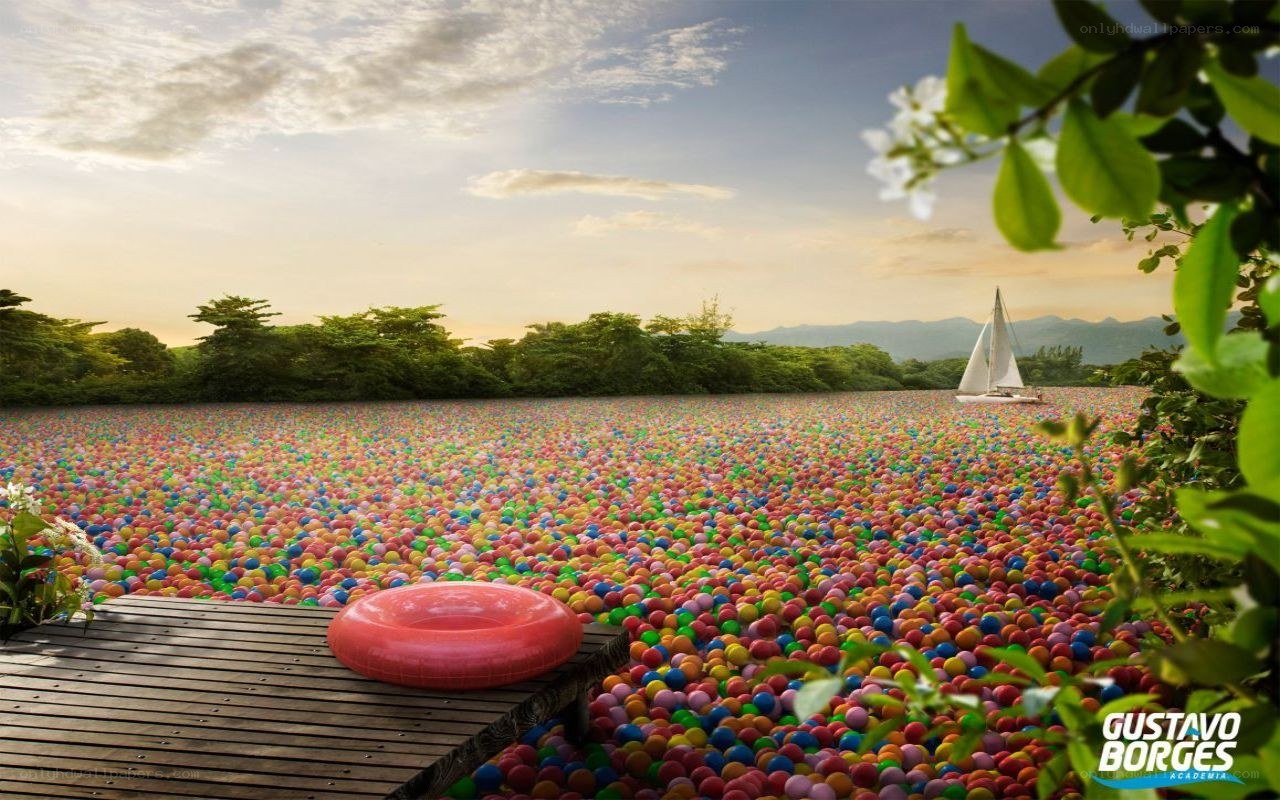 Ball pit lake with sailboat