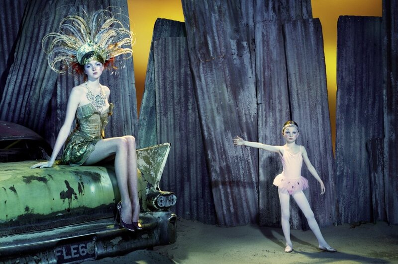 Ballerina and performer in surreal scene