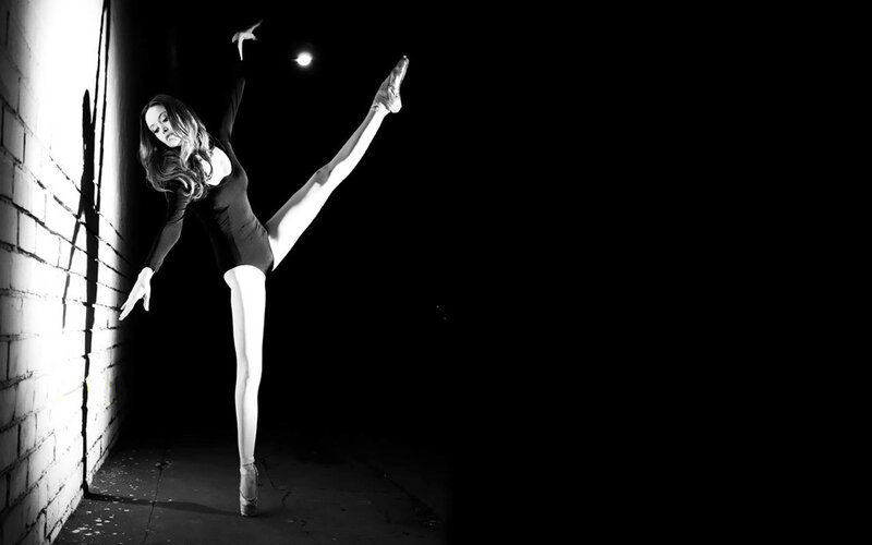 Ballerina in a dark alley