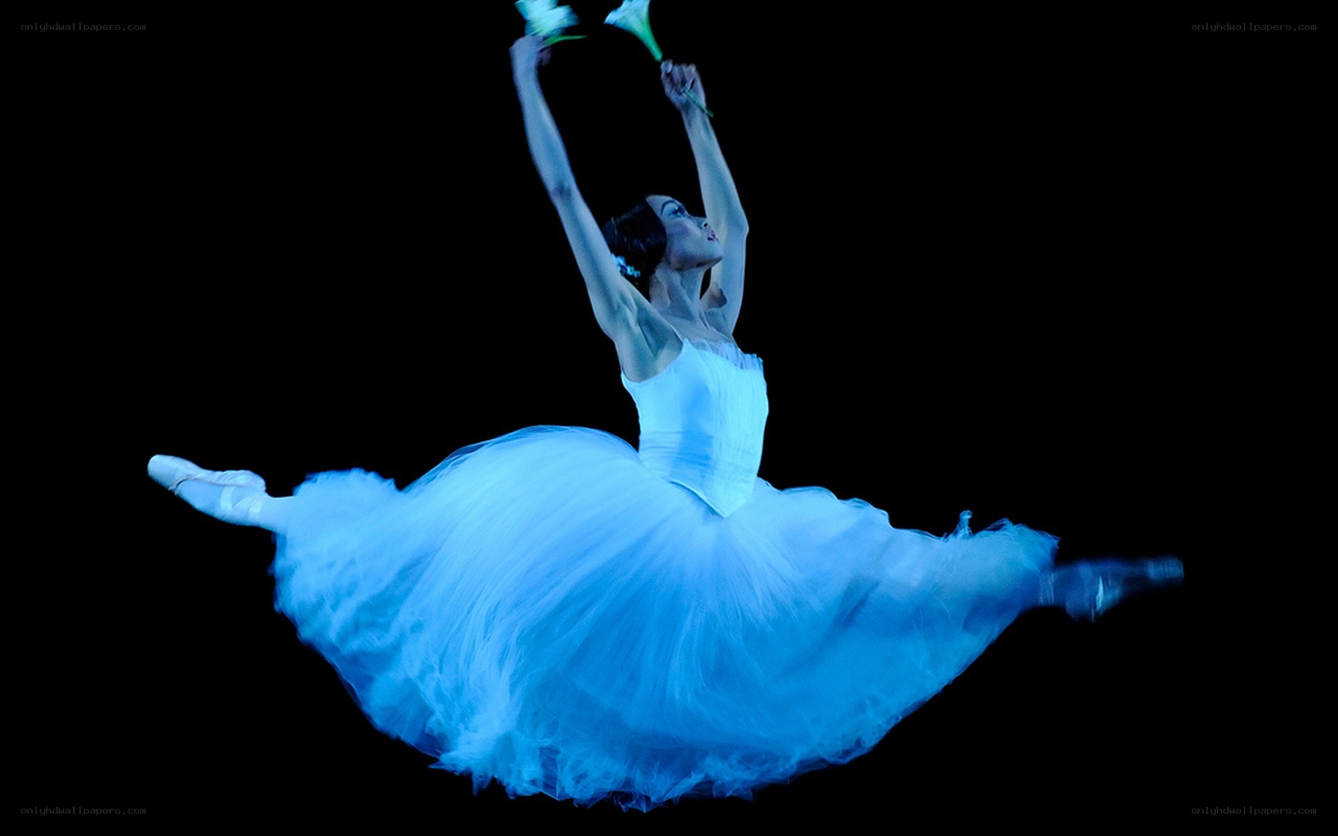 Ballerina in blue light